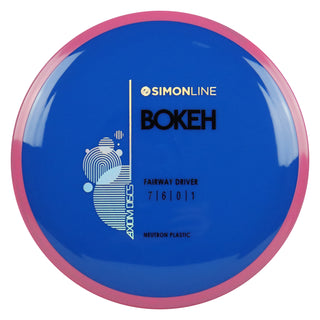 Axiom Disc Golf Simon Line Neutron Bokeh Fairway Driver 7/6/0/1 Dark Blue/Pink 169 grams