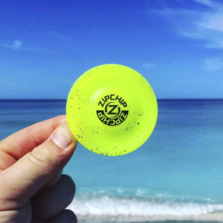 Disc Golf ZipChip - Mini Flying Disc - Soft Rubber Catch Disc - Neon Yellow