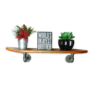 Floating Industrial Style Vintage Mahogany Skateboard Deck Shelf with Pipe Mounting System â€“ Custom Made Indoor Skate Shelving